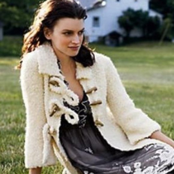 sleeping on snow sweater jacket